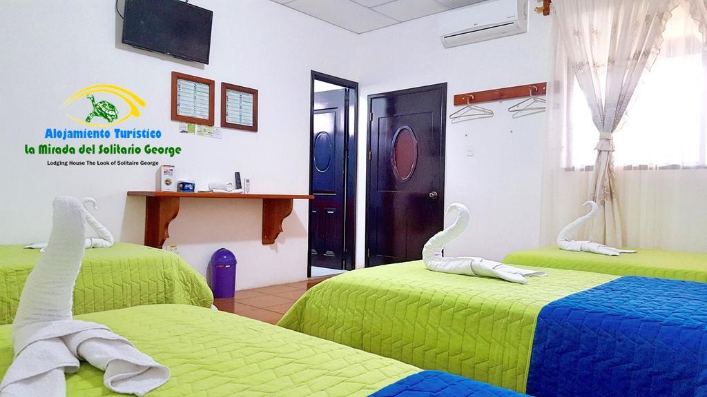 Hostal La Mirada Del Solitario George Пуэрто-Айора Экстерьер фото