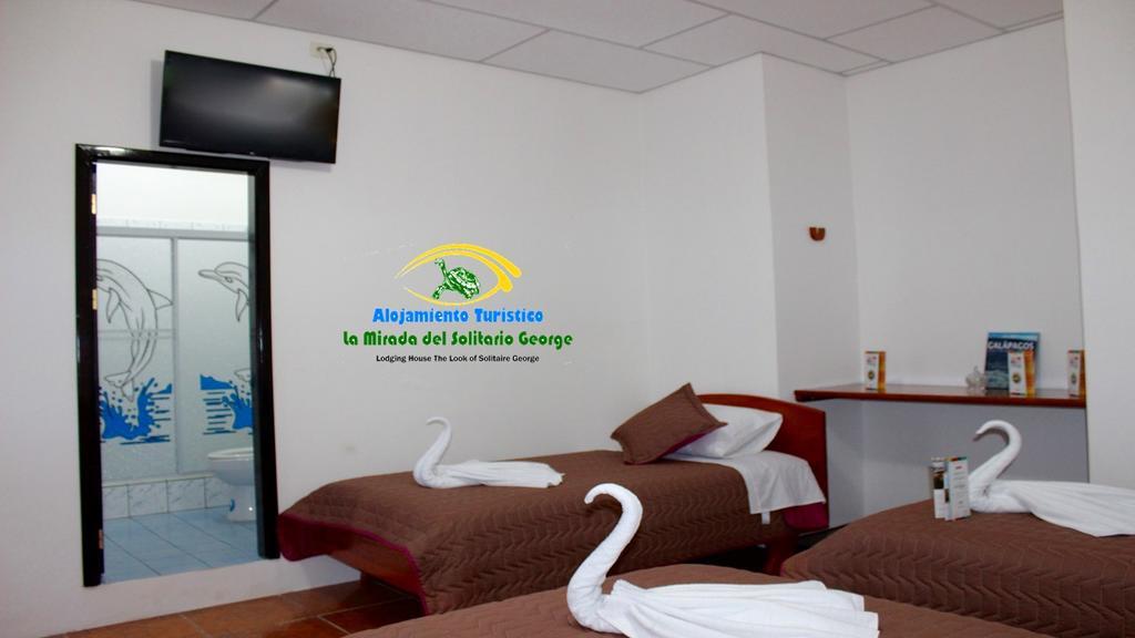 Hostal La Mirada Del Solitario George Пуэрто-Айора Экстерьер фото
