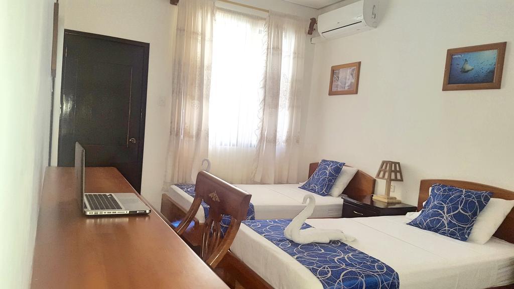 Hostal La Mirada Del Solitario George Пуэрто-Айора Экстерьер фото
