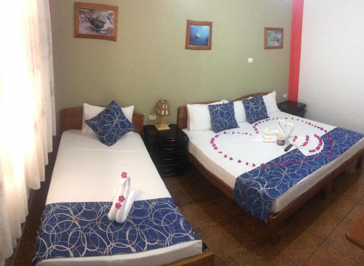 Hostal La Mirada Del Solitario George Пуэрто-Айора Экстерьер фото